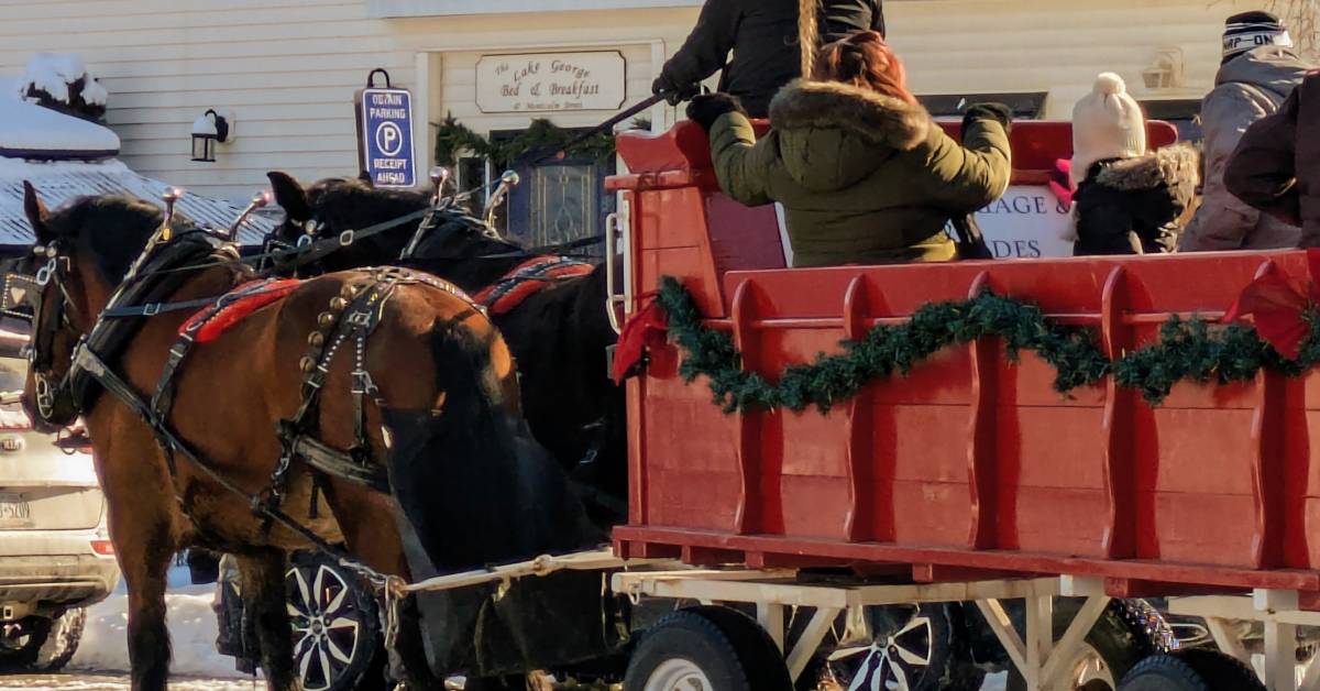 horse and wagon ride at lake george winter carnival