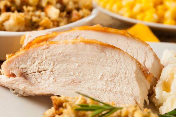 turkey breast with stuffing and corn