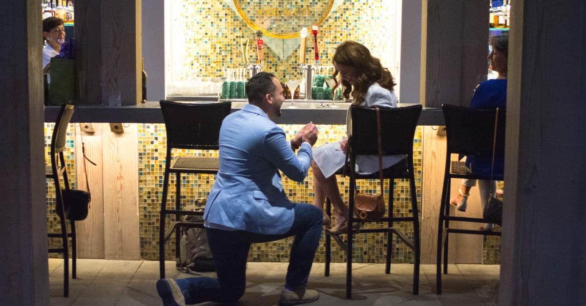 a proposal on a patio in the evening