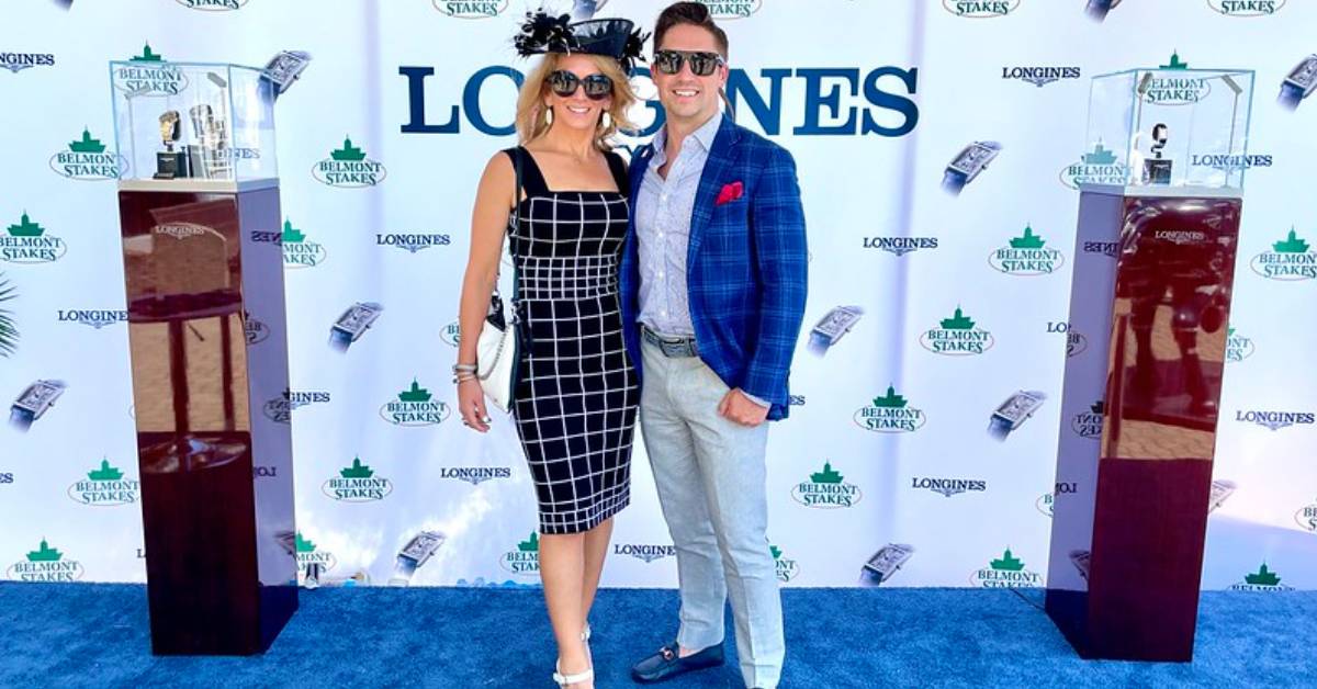 man and woman dressed up at horse race event