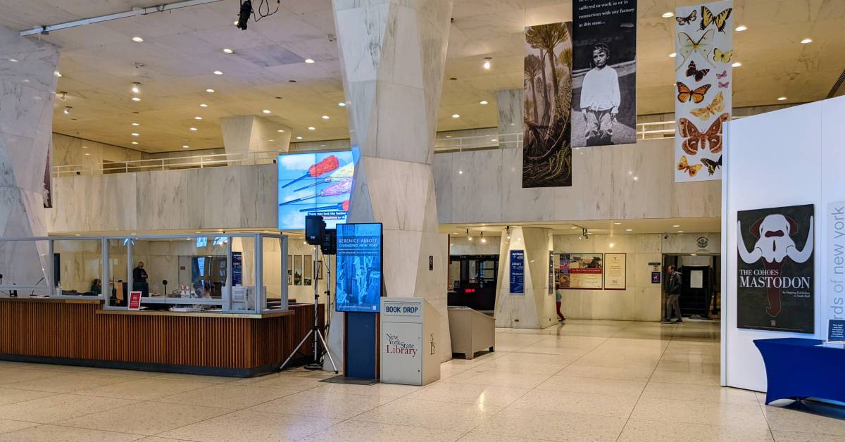 Granite lobby area with desk and signs
