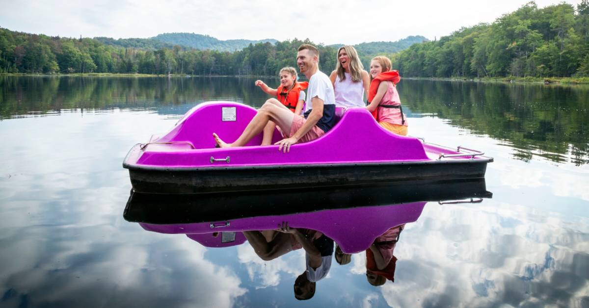 family in paddleboat
