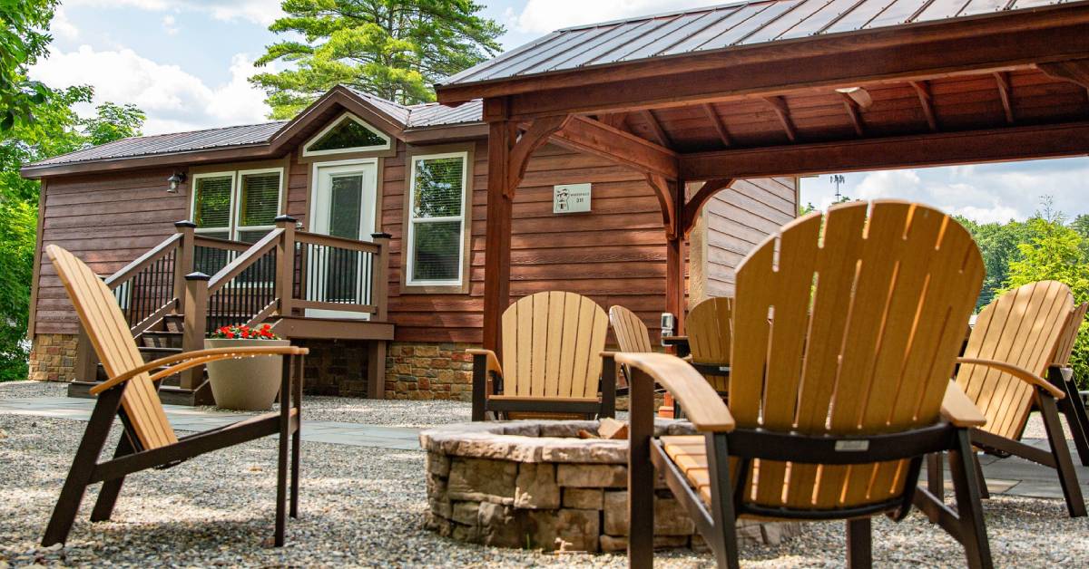 chairs around fire pit in front of trailer rental