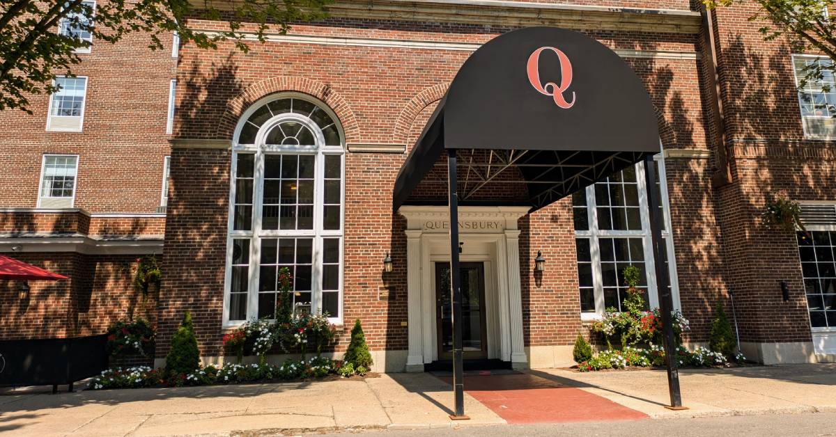 exterior of queensbury hotel
