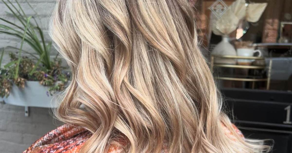 a woman's brown hair with blonde highlights