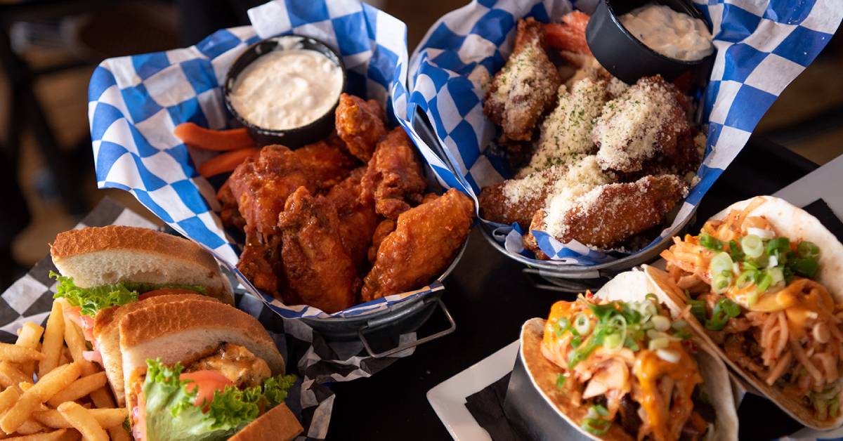 chicken wings, sandwich, tacos at lake george beach club