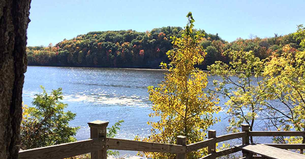 view of a river from a fenced area