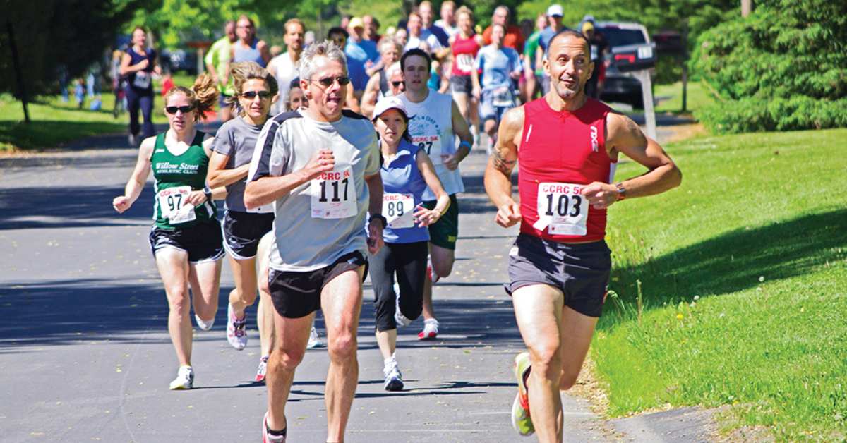 runners going down a road