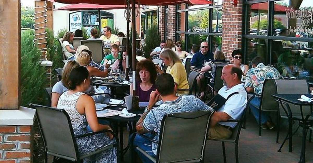 people seated on a restaurant patio