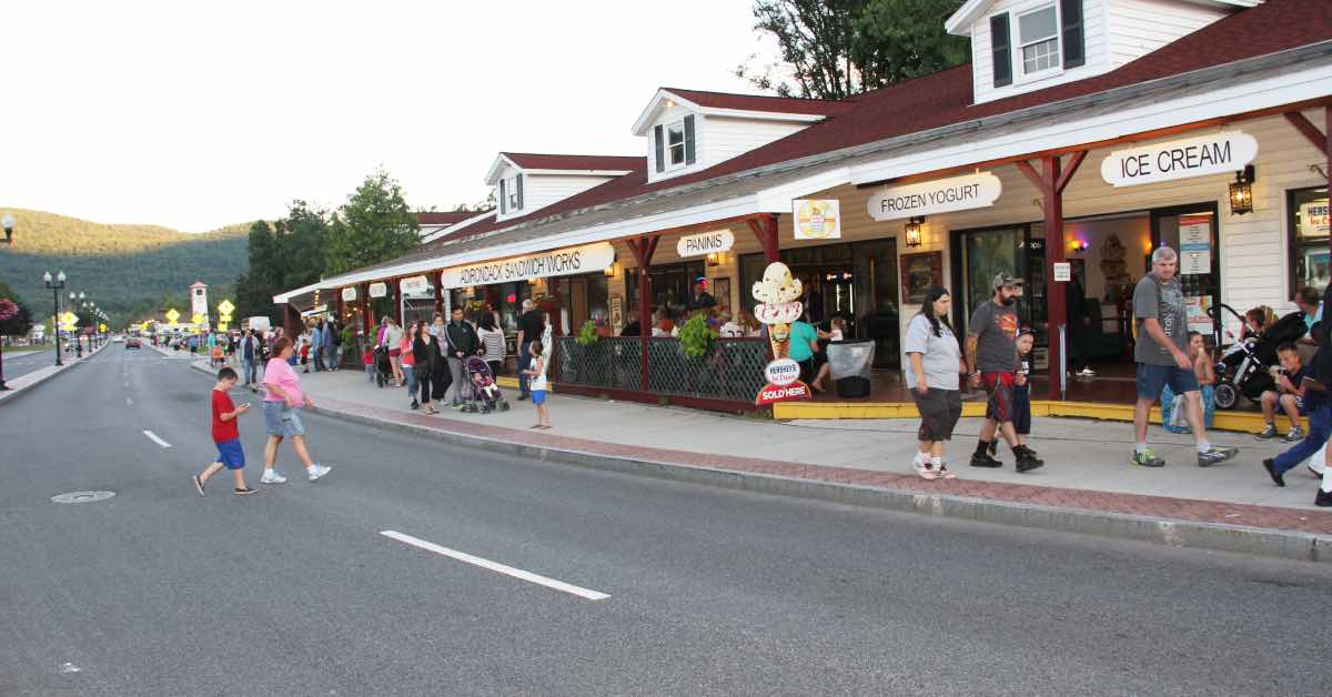 people walking along Beach Road in Lake George