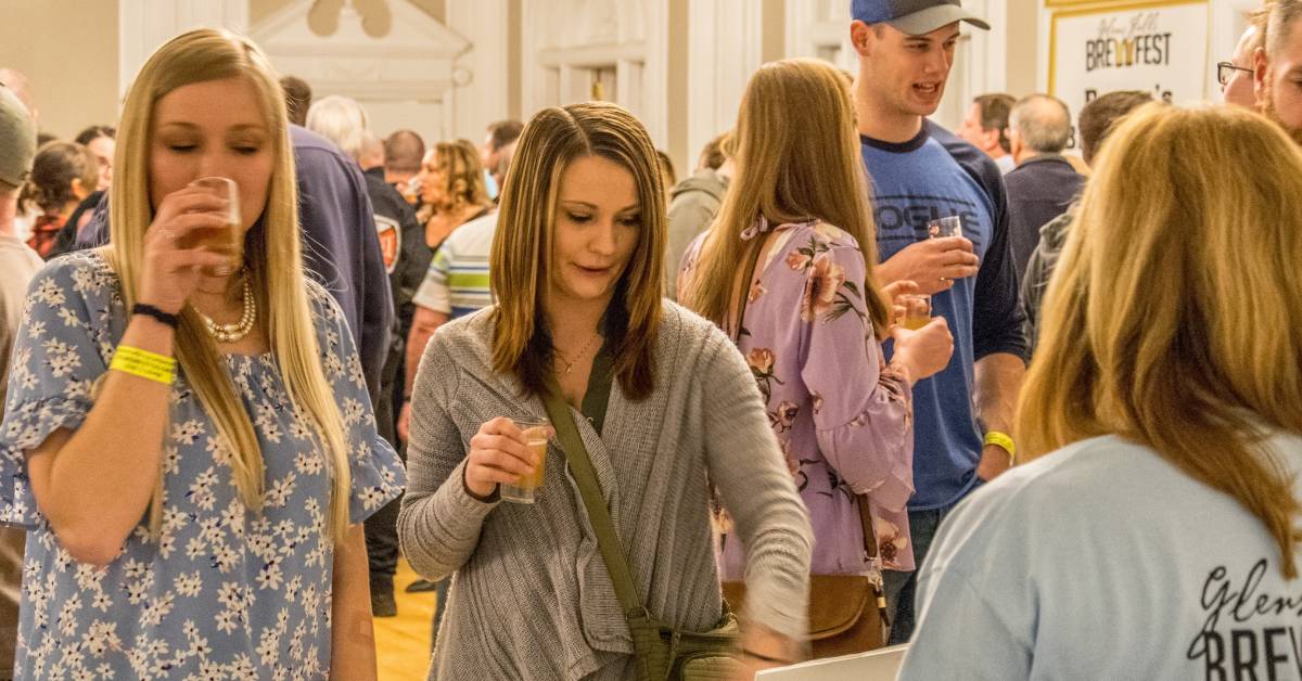 women sampling beer at glens falls brewfest