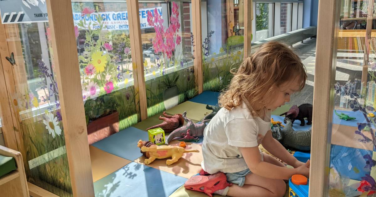 little girl in play room at crandall public library