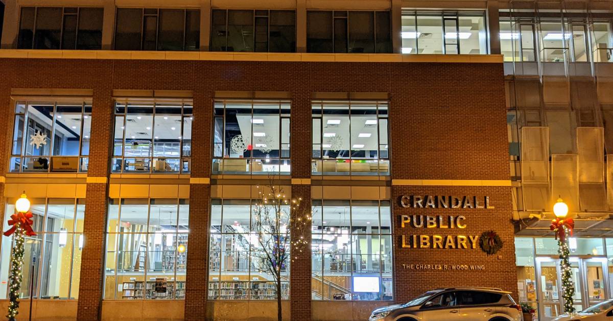 exterior of crandall public library at night