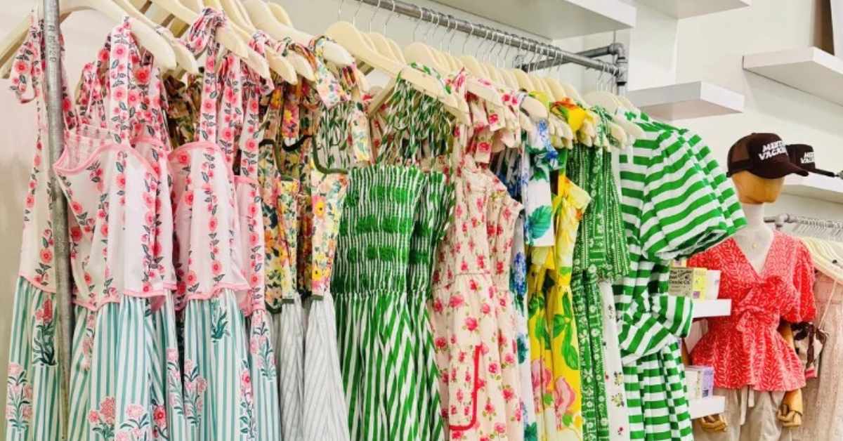 multi-colored dresses hanging on a rack