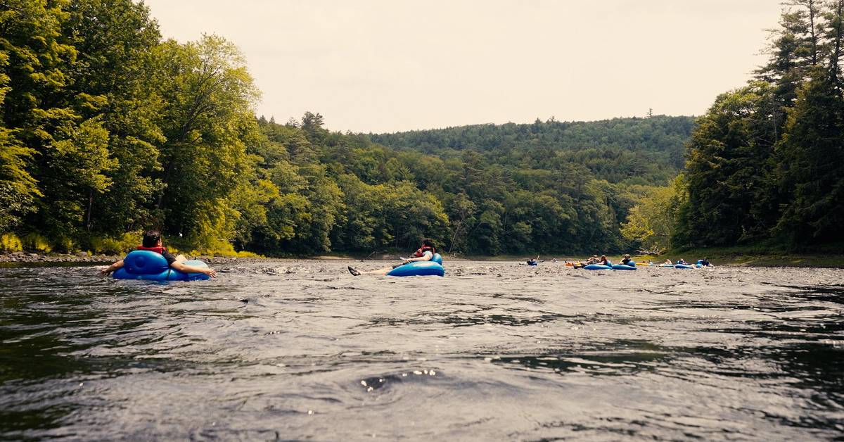 people lazy river tubing