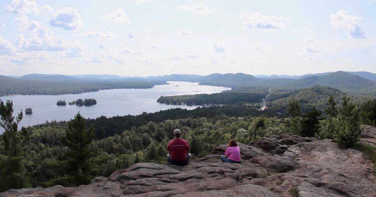 dad and kid at mountain summit