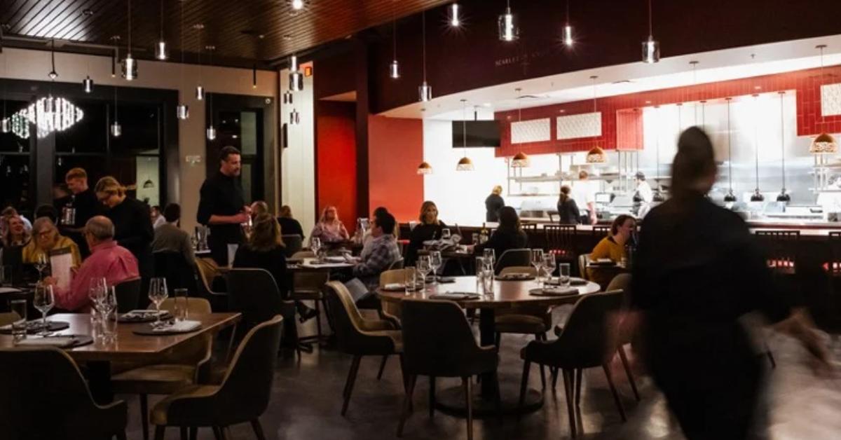 customers dining in a darkly lit restaurant