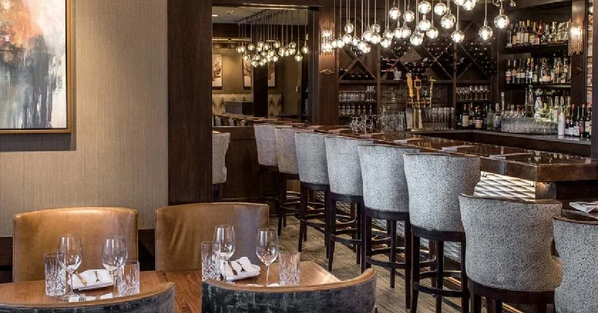 inside of an upscale dining room and bar