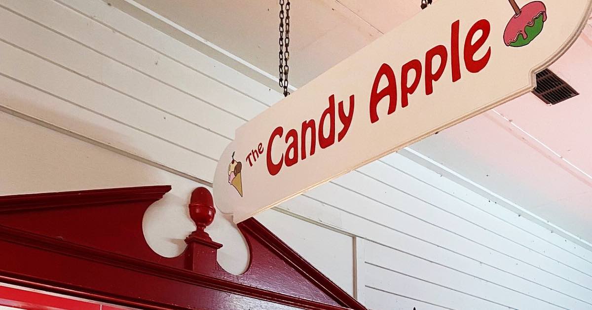 The Candy Apple sweet shop sign on Beach Road in Lake George known for handmade treats