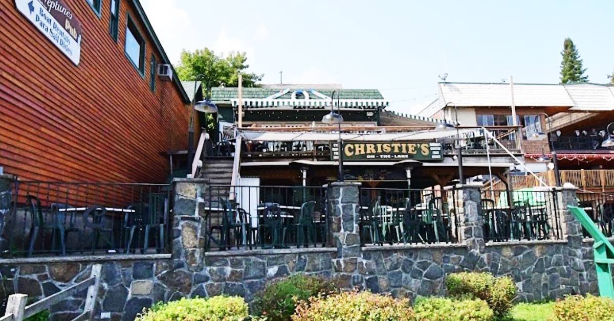 Christie’s on the Lake restaurant in Lake George with outdoor patio seating and multi-level deck