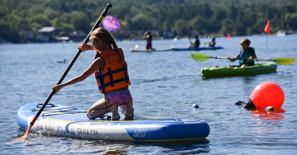 kids on SUP and in a kayak