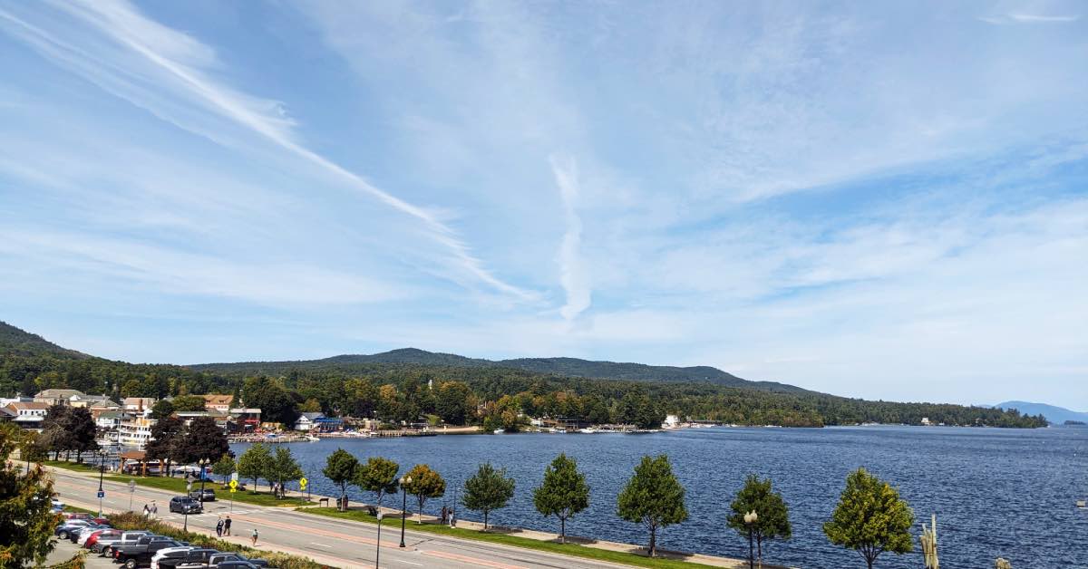 Beach Road in Lake George with waterfront views and Adirondack Mountains