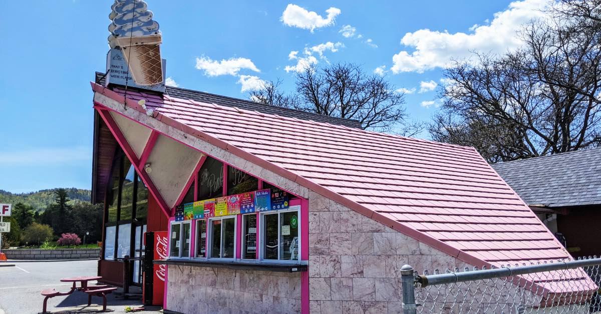 The Pink Roof ice cream stand on Beach Road in Lake George with iconic bright pink roof