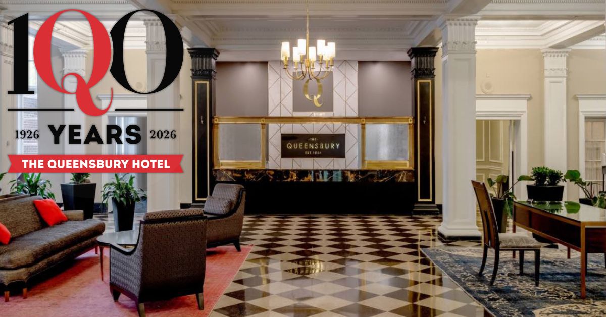 Queensbury Hotel lobby and 100 years logo