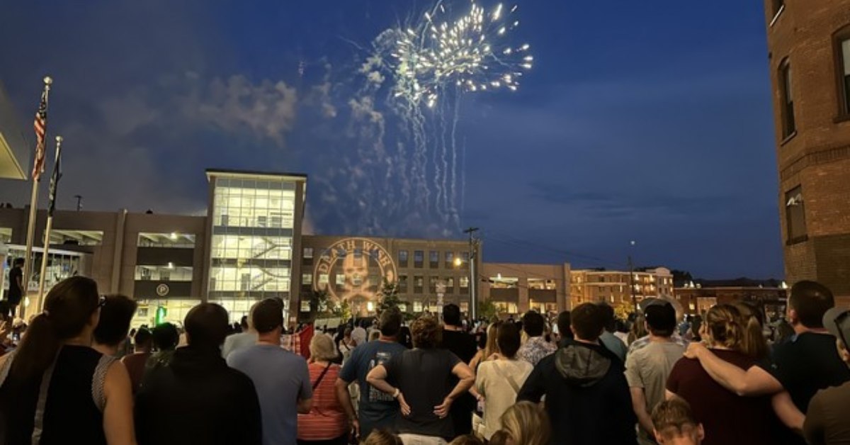 fireworks in a city in the evening