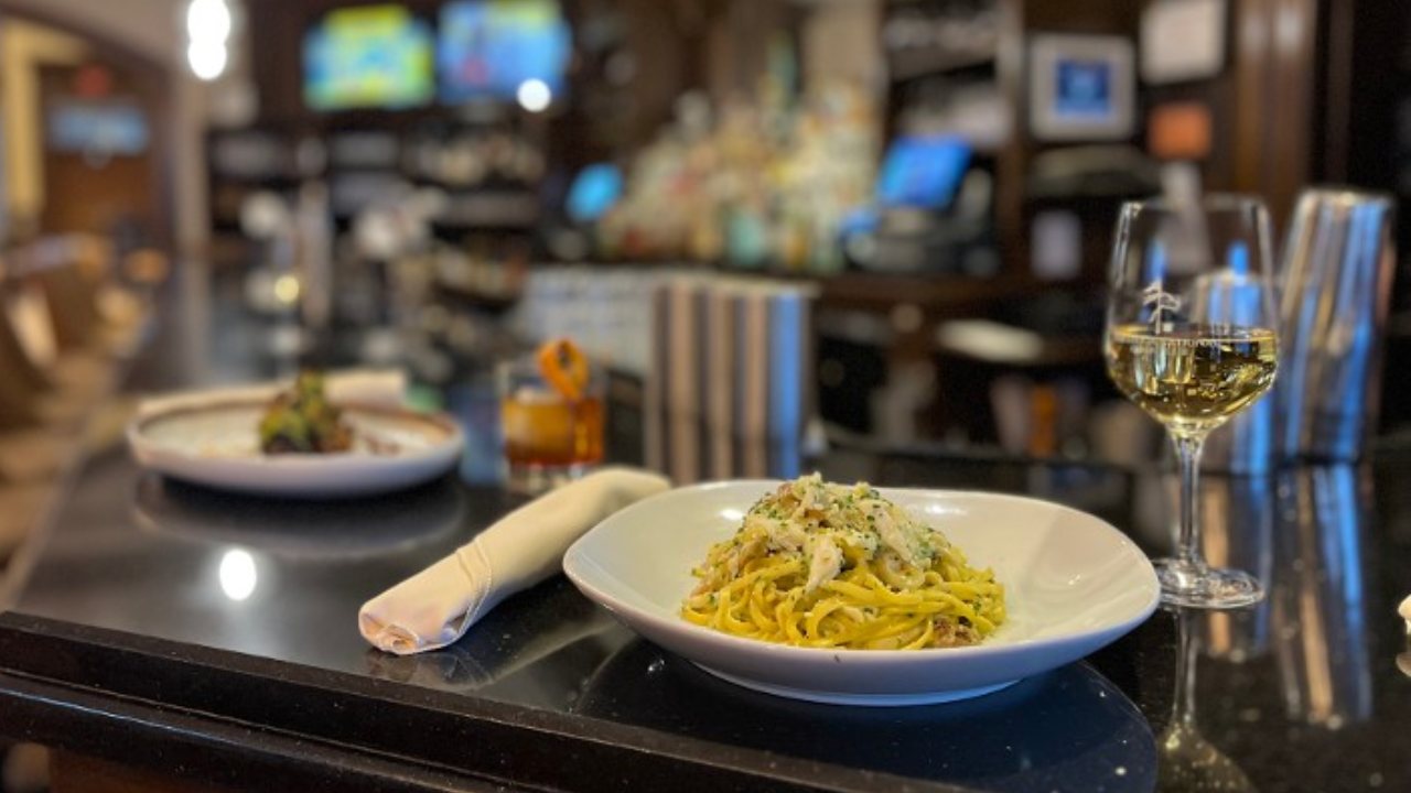 pasta and wine at bar
