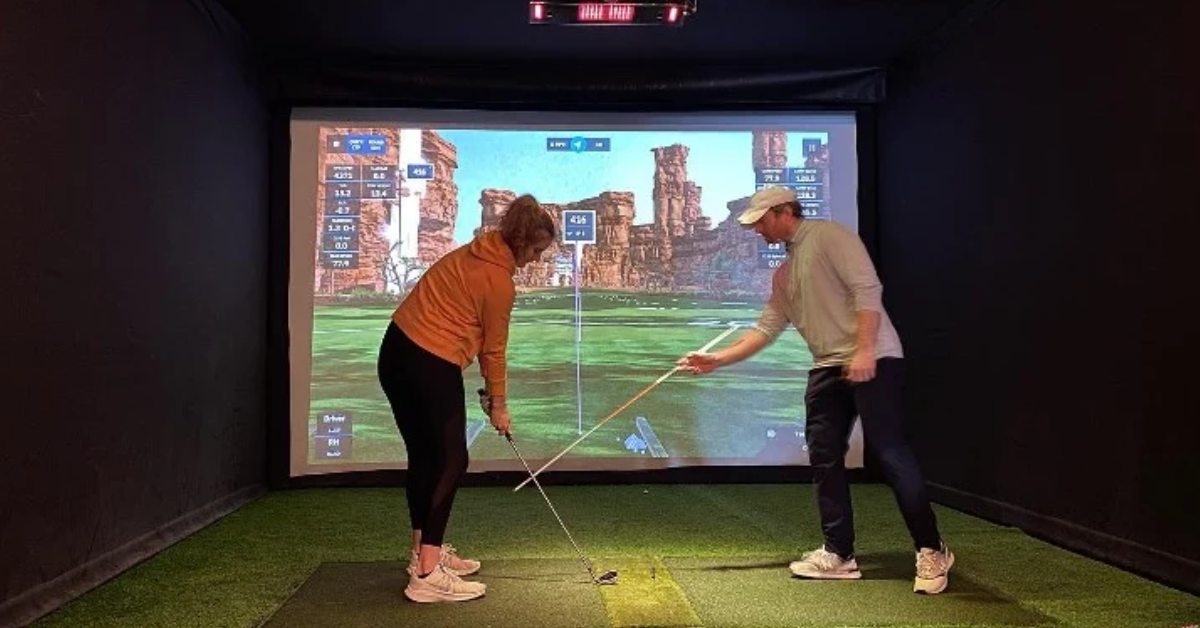 people play golf with a screen