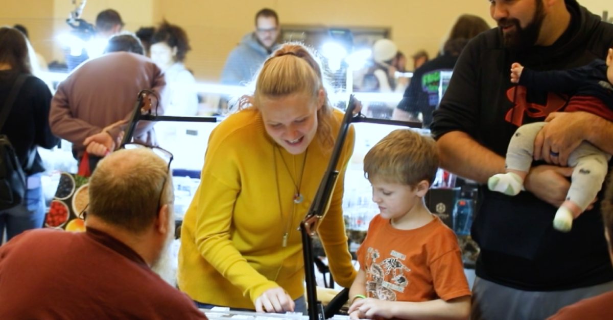 a family checking out a display