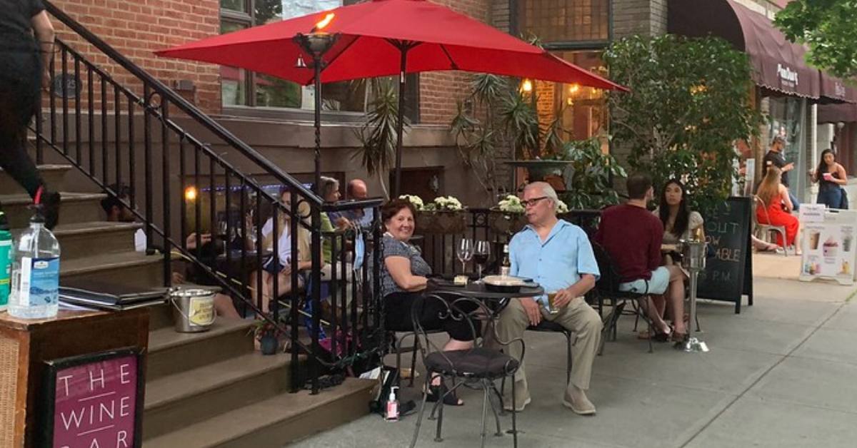 people sitting outdoors at restaurant