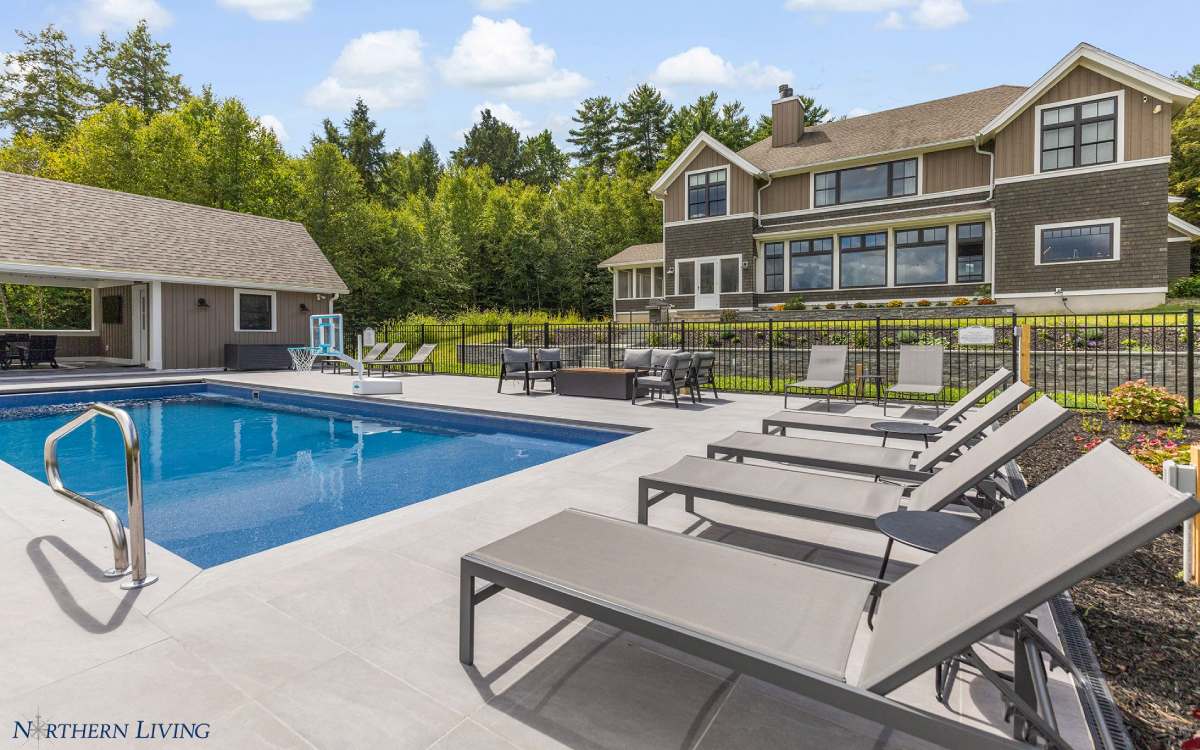 a luxury home with a pool