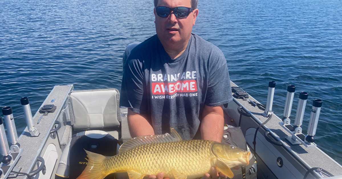 man holding a fish