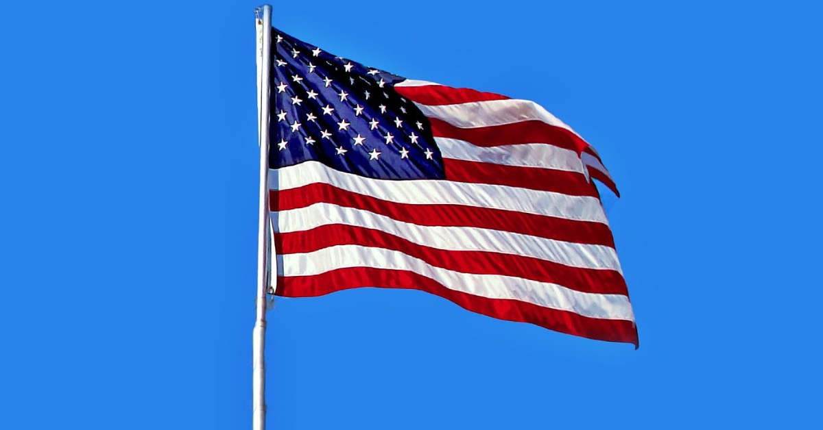 a US flag on a pole