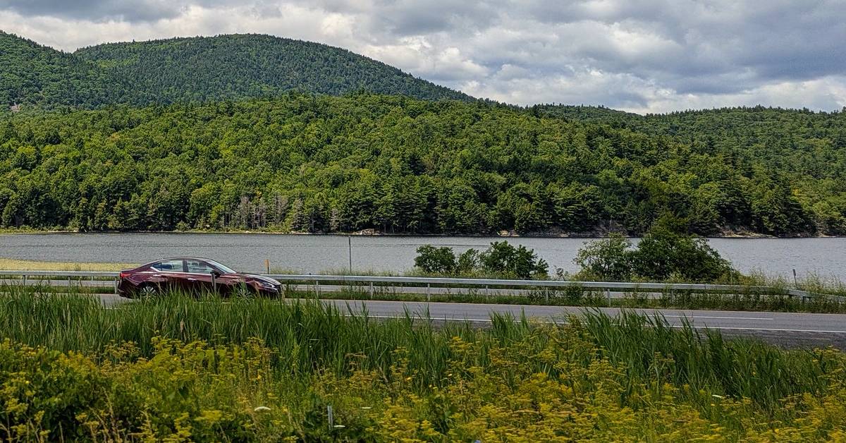car driving through adirondacks