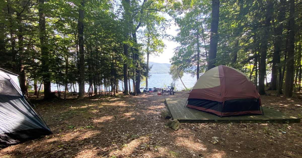 a camping tent on a platform