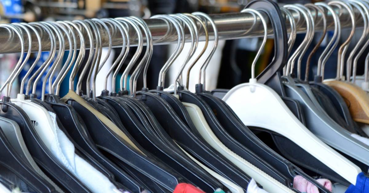 clothes on a rack in a shop