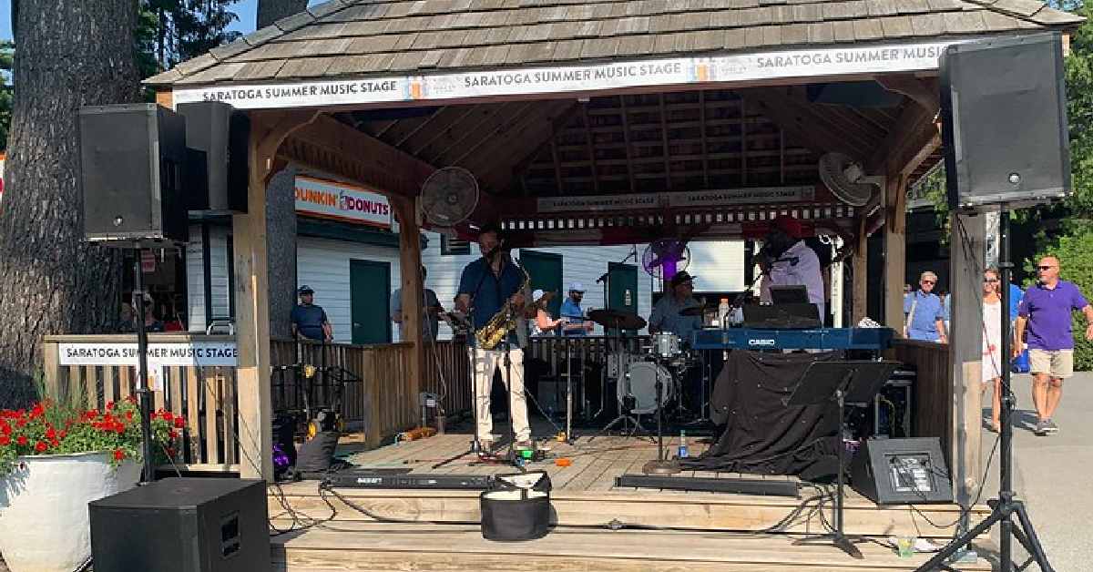 person performing under a pavilion