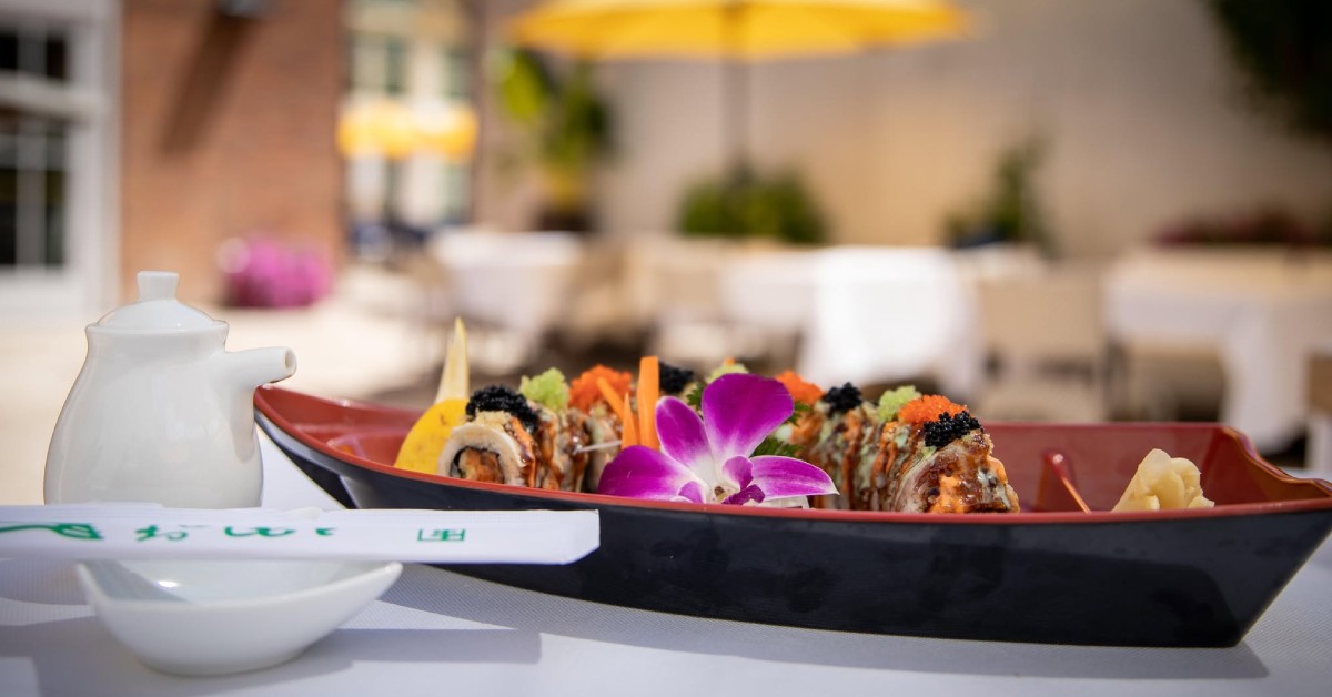 sushi boat decorated with a purple flower