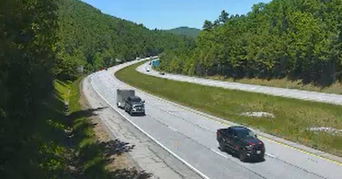 webcam screenshot of road with vehicles