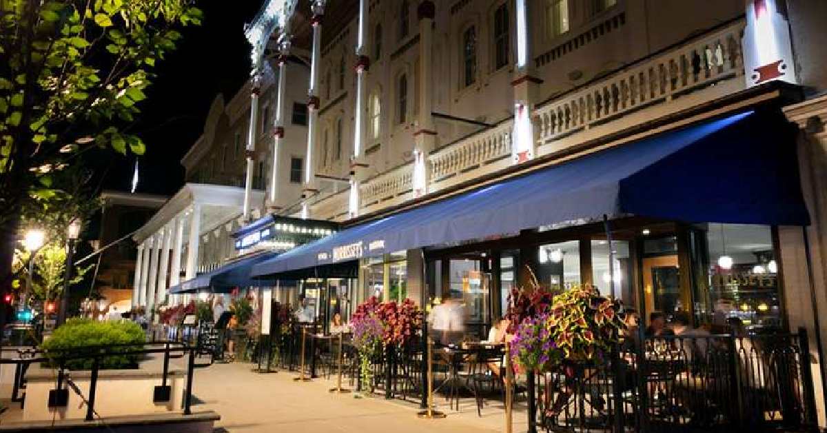 Outside of a restaurant with blue awning