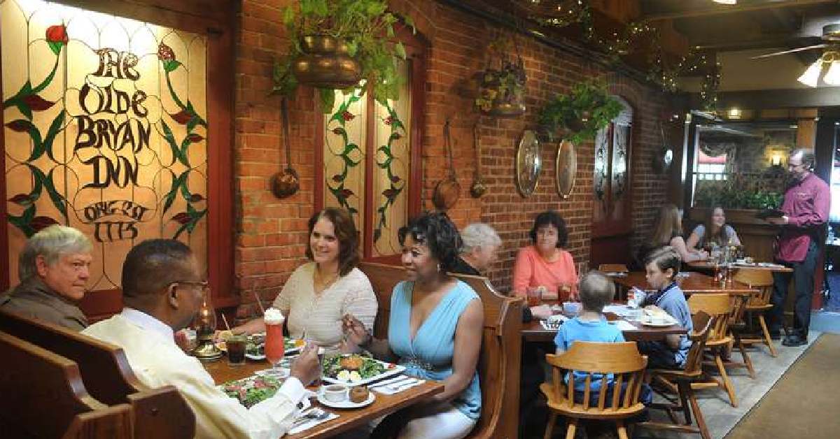 Families sitting down to eat