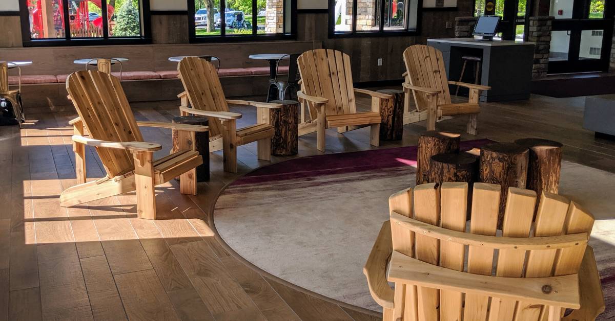 several adirondack chairs inside the adirondack welcome center