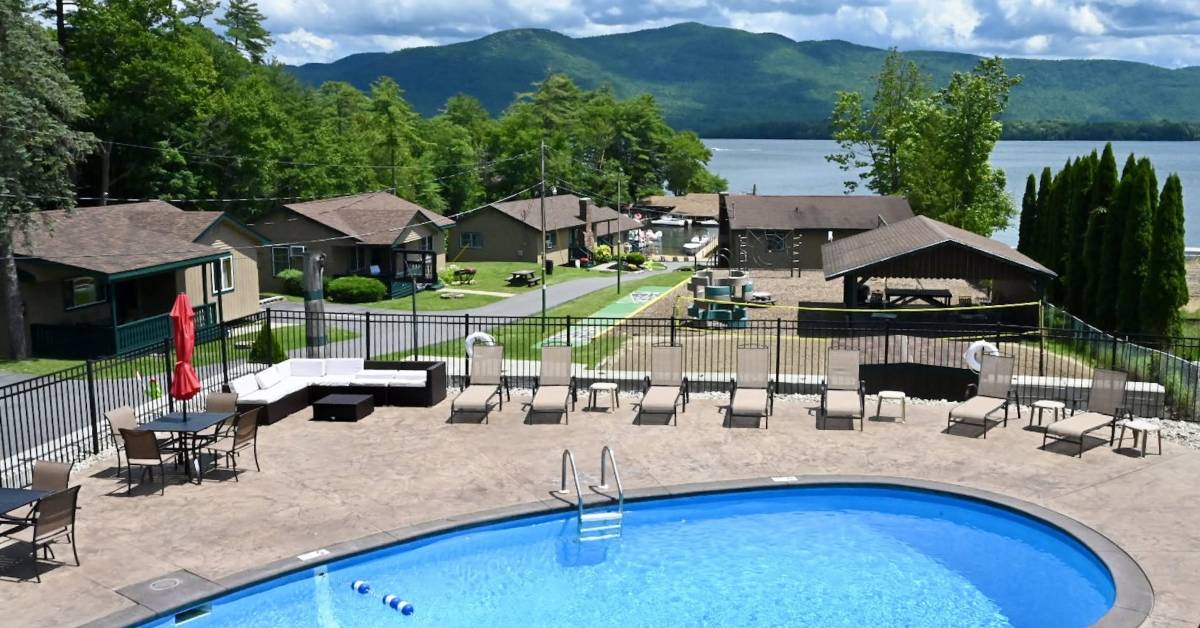 pool area and cabins by lake