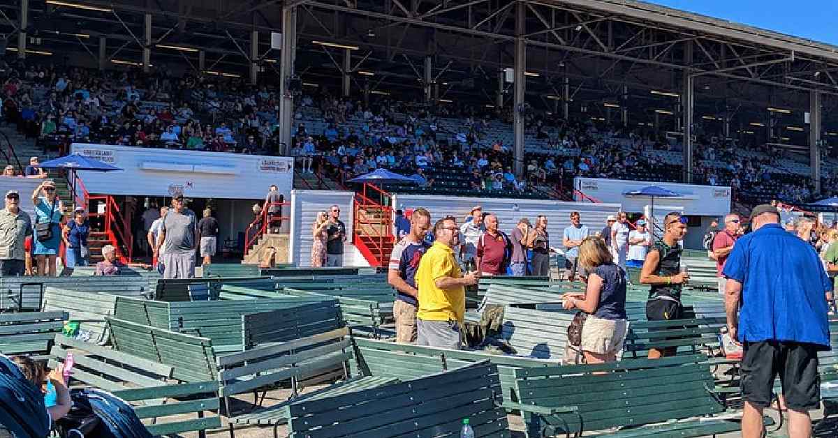 people gathered in the grandstand to watch the next race