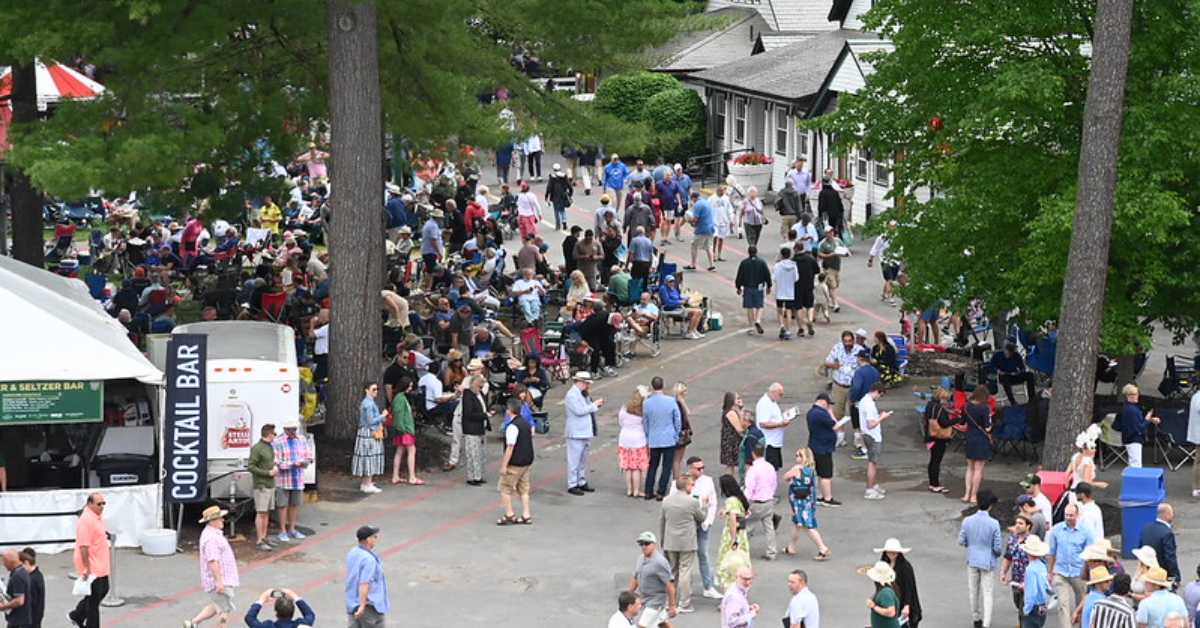 crowd of people walking around Saratoga Race Course