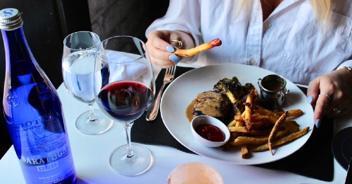 Fresh food and glass of wine on a table