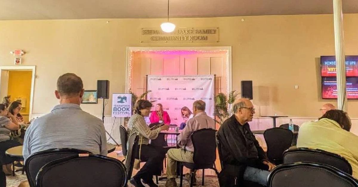 people gathered in a conference room